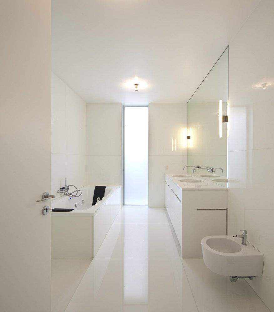 A narrow vertical window for a bathroom