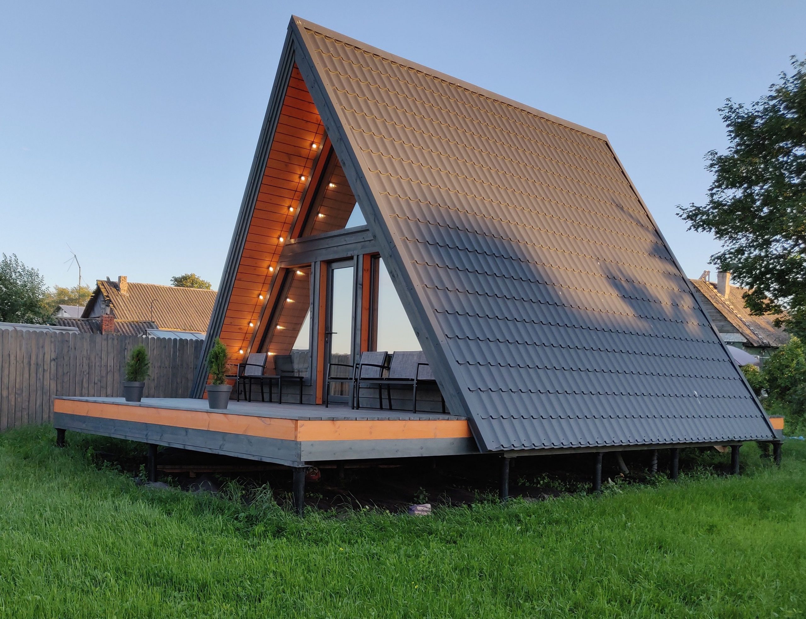 The Grey Design of An Attic Cabin