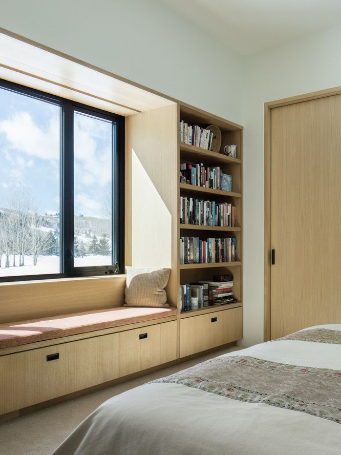 Minimalist Home Library with A Window Seat