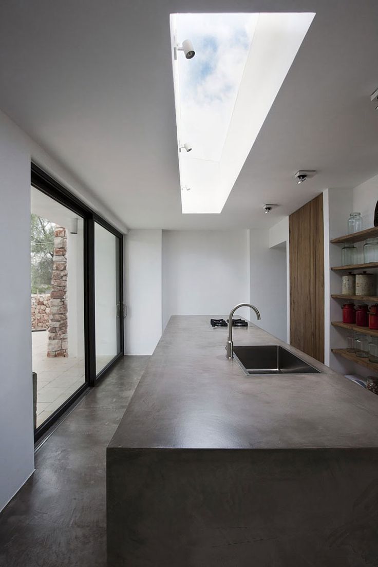 Concrete Kitchen with Skylight