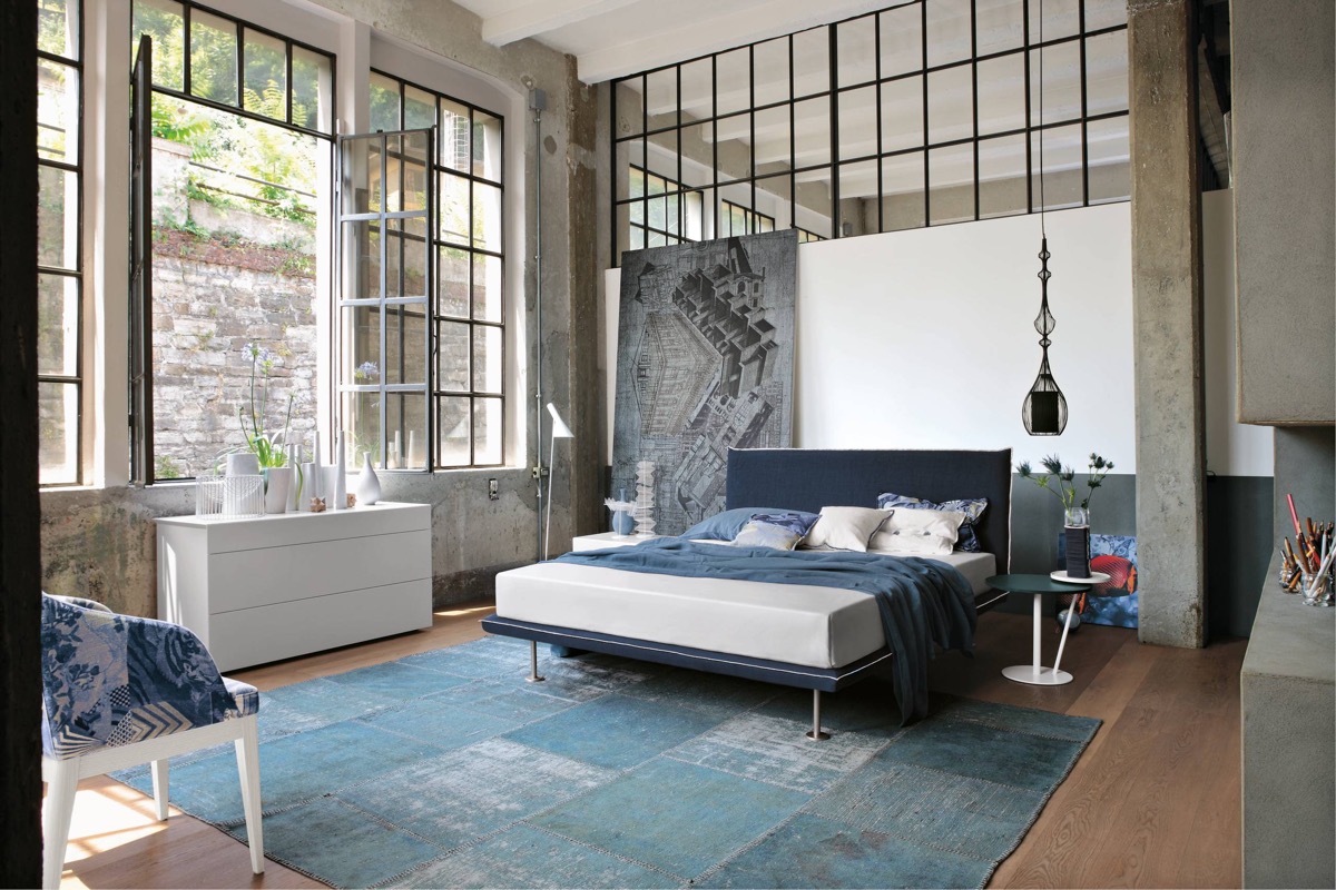 Bright Industrial Bedroom with Large Window