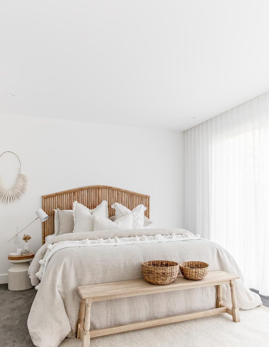 Coastal Bedroom with Pure White and Brown Accents