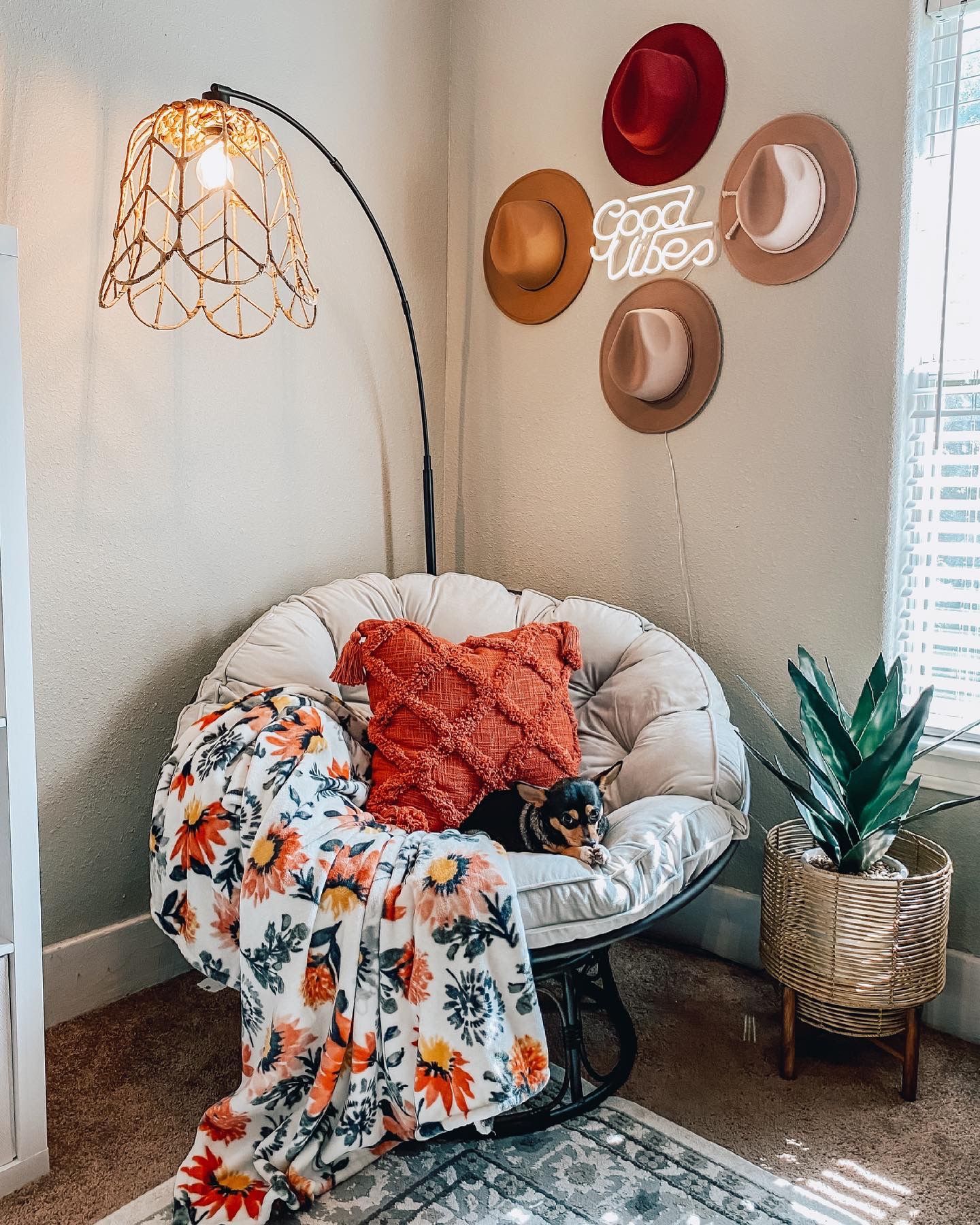 Bohemian Rattan Chair with Stylish Floral Blanket