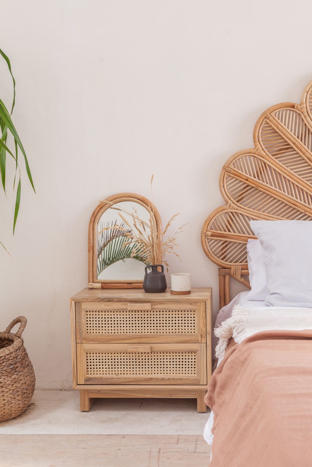 Rattan and Timber Bedside Table in A Bohemian Bedroom