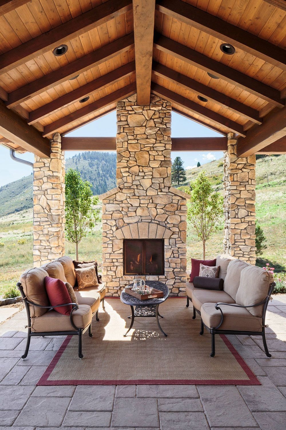 Relaxing Backyard with Stone Fireplace
