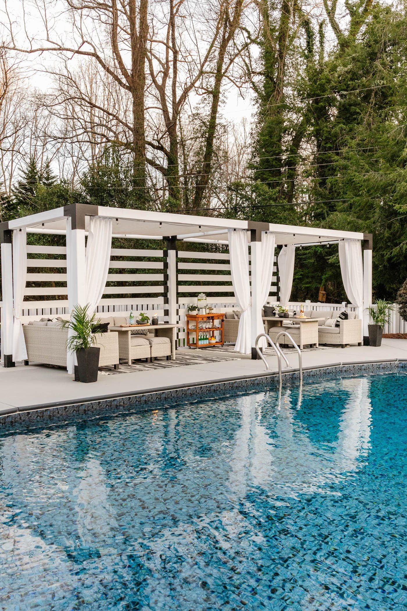 2 Sitting Areas in White Pergola