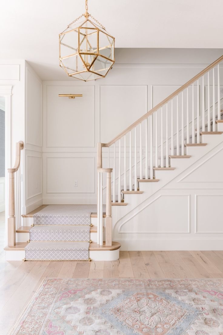 Timeless White Railings and Neutral Handles